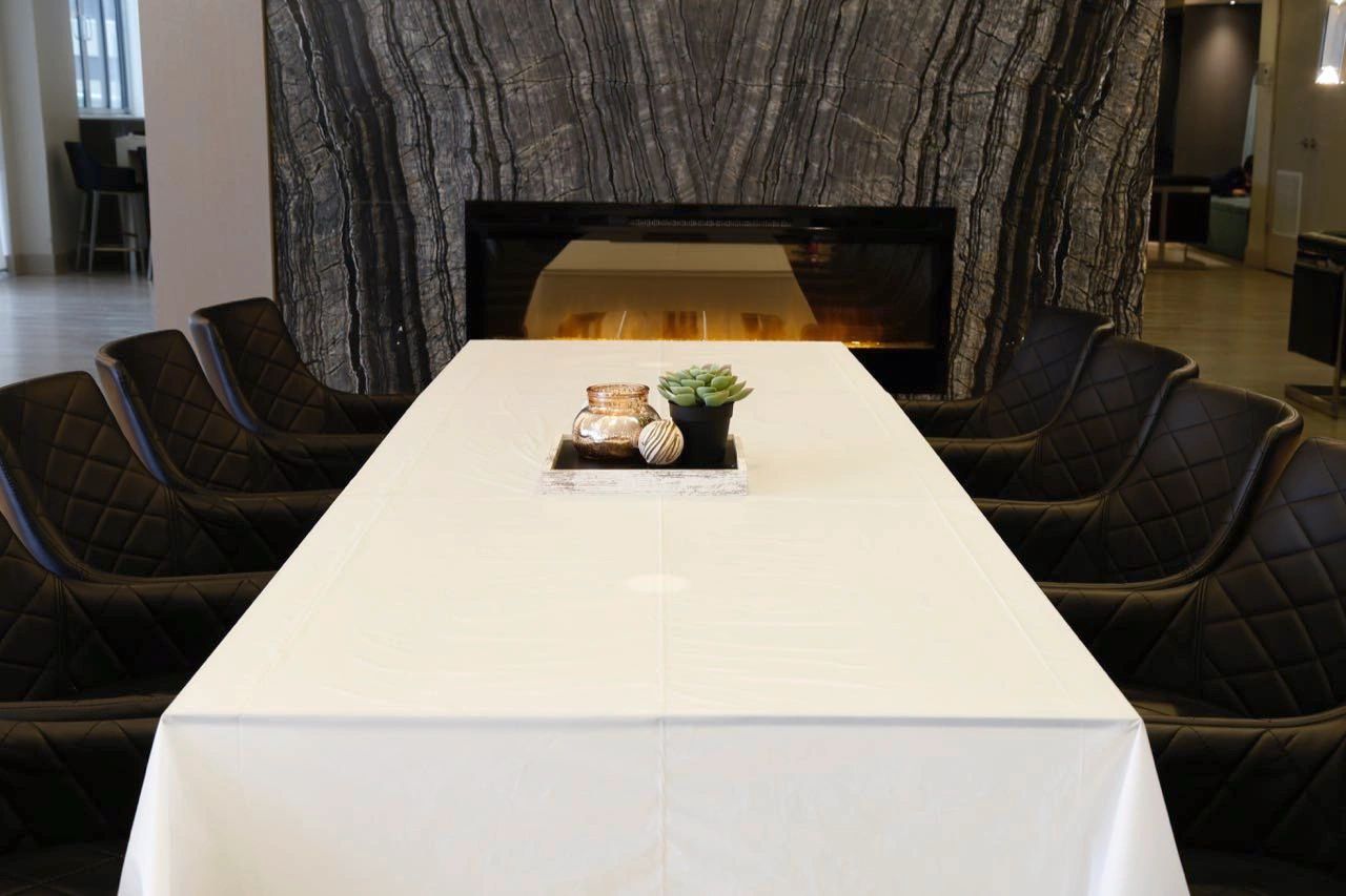 White Disposable Plastic Table Cloth Roll - 54 in x 108 Ft